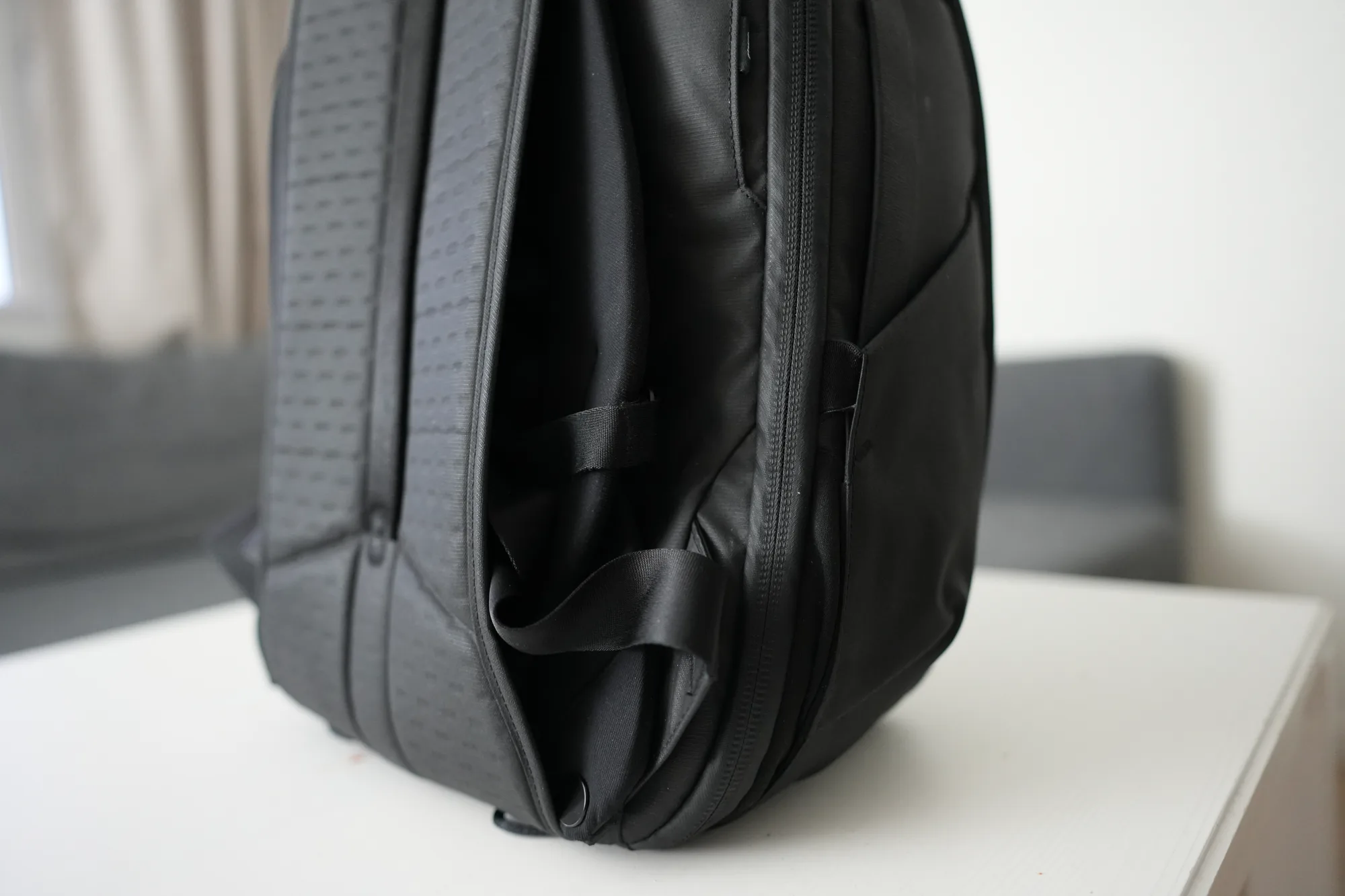Peak Design Travel Backpack 30L side view showing bottom straps