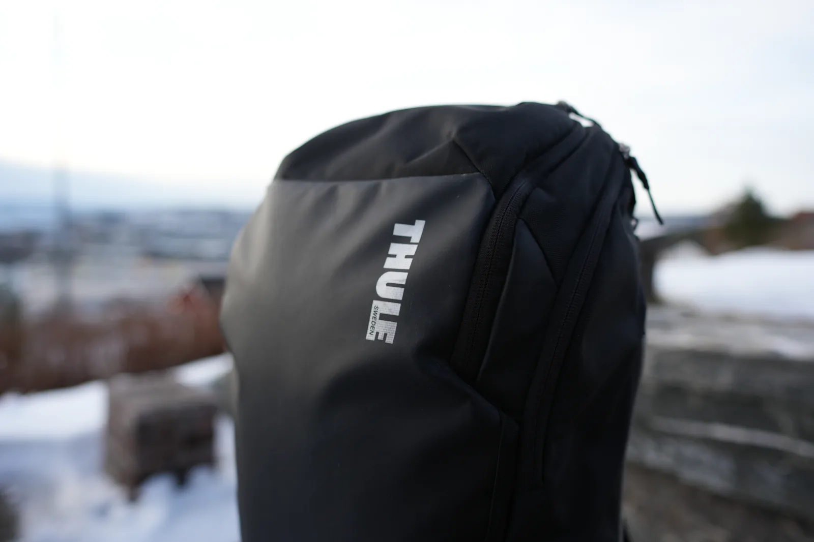 Thule Sweden logo close-up on the Chasm 26L backpack