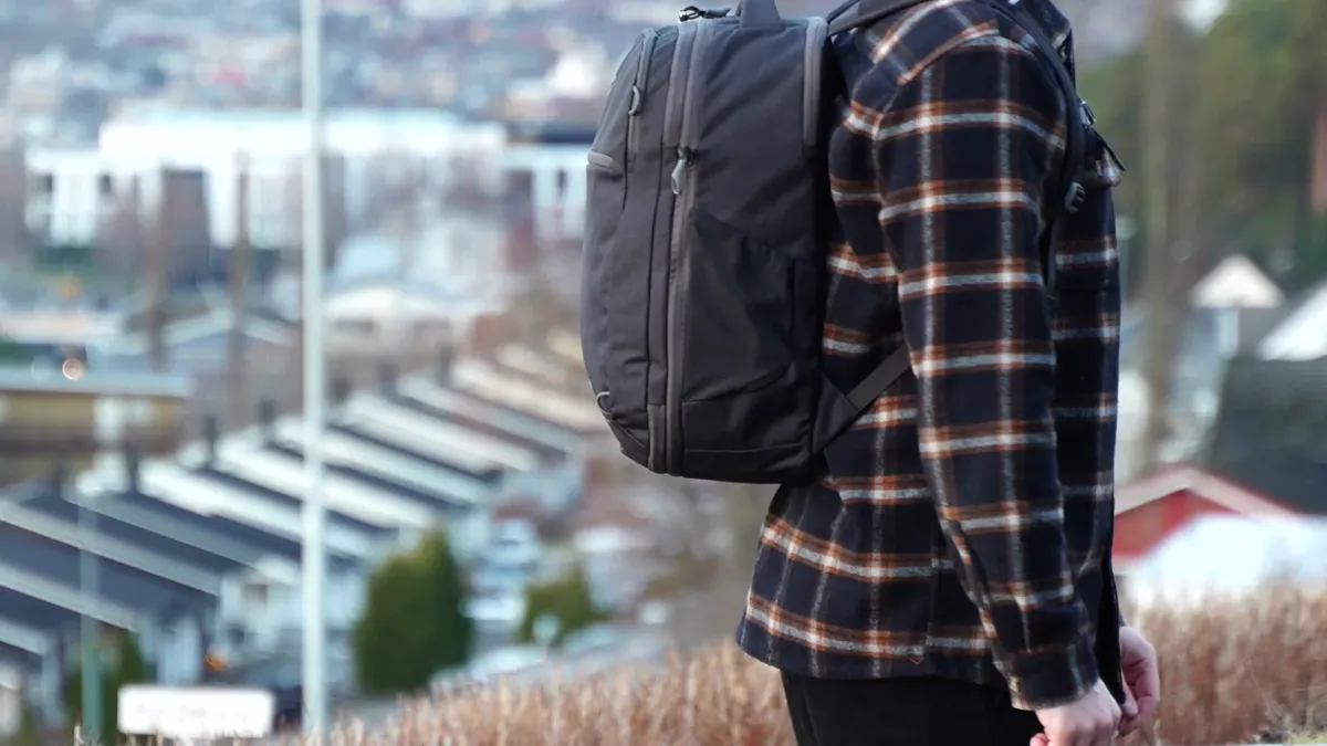 Osprey Daylite 26+6 worn on body showing side profile and slim silhouette