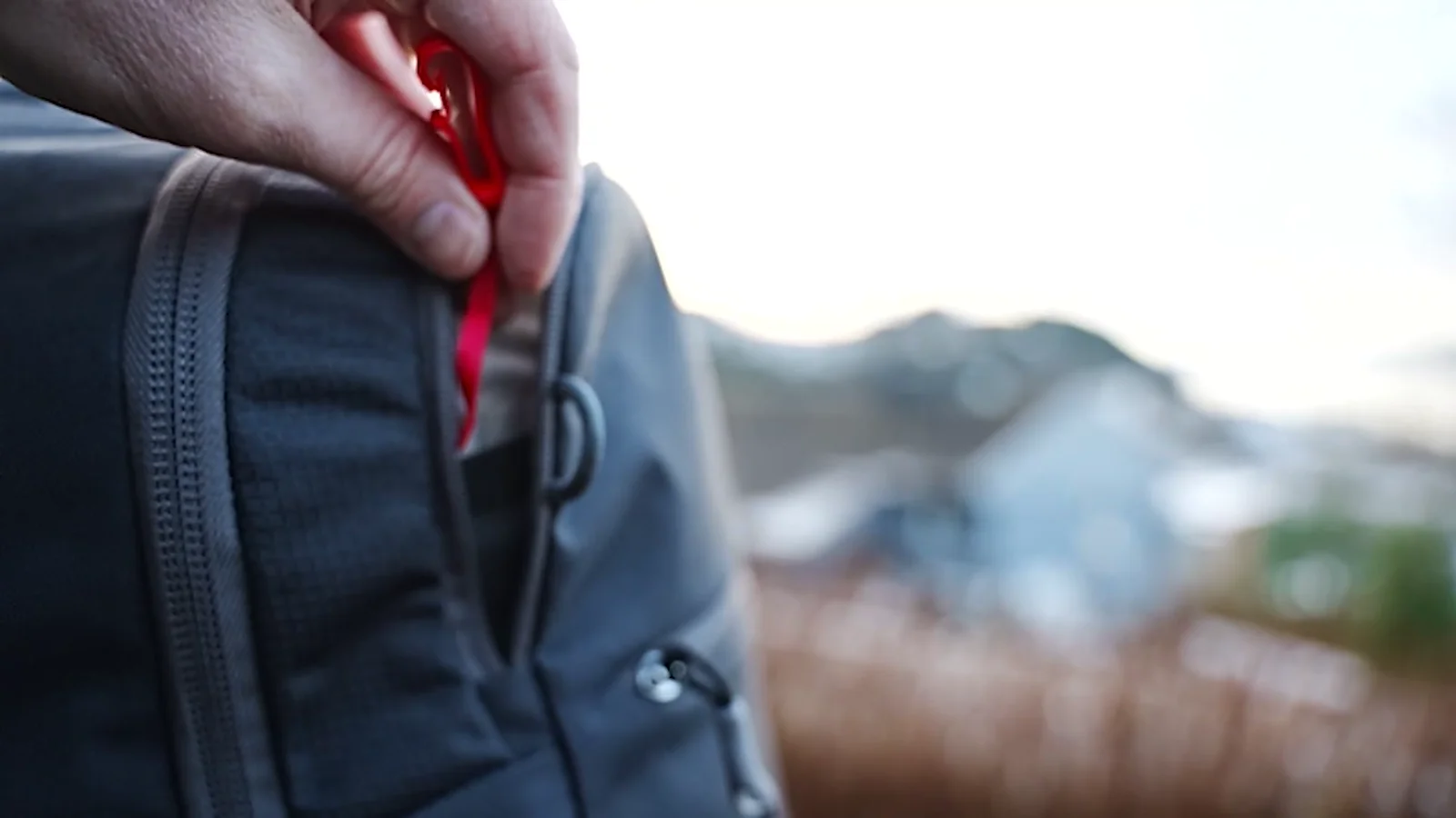 Close-up of Osprey Daylite lockable anti-theft zipper pull